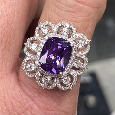 Anna Zuckerman Luxury 10 Carat Amethyst Cocktail Ring In 925 Sterling Silver New! Luxury High End Designer Azl Retail Price: $199 Size - 6 (Can Be Resized) 10 Carat Total 8 Carat Cushion Cut (Rectangular) Amethyst 2+ Carats (Total) Diamond Crystalline Scalloped Halo Solid 925 Sterling Silver With Platinum Plating Includes Gift Box & Jewelry Polishing Cloth February Birthstone Stunning 8 Carat Cushion Cut Amethyst With A 2+ Diamond Crystalline Double Flower Crown Scalloped Halo In A 925 Sterling Purple Cushion Ring, Teal Rings, Geometric Diamond Ring, Amethyst Cocktail Ring, Gift Box Jewelry, Red Stone Ring, Cocktail Dinner, Stackable Rings Silver, Simulated Diamond Rings