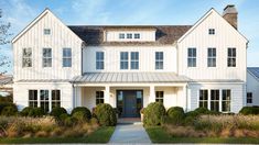 a large white house with lots of windows