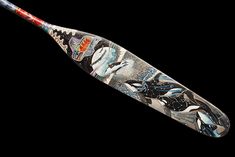 a baseball bat with an artistic design on it