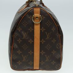 Brand: Louis Vuitton Model: Speedy Bandoulière 35 Color: Brown Material: Canvas Inclusions: Padlock / Key×2 / Shoulder Strap Dimensions: W35cm x H23cm x D19cm / Shoulder Drop:55cm Serial number: DU4191 Country of origin: France Condition: AB - good condition. The Louis Vuitton Speedy Bandoulière 50 handbag is a classic and versatile piece, crafted from the brand’s signature Monogram Canvas in a rich brown hue. Designed for both style and functionality, this bag is perfect for daily use or travel Travel Bag With Top Carry Handle In Monogram Canvas, Luxury Satchel Travel Bag For Errands, Classic Monogram Canvas Bag With Handles, Classic Monogram Canvas Duffle Bag, Brown Monogram Canvas Bag With Top Carry Handle, Rectangular Monogram Canvas Duffle Bag For Everyday, Designer Brown Travel Bag With Top Carry Handle, Monogram Canvas Travel Bag For Daily Use, Business Bag With Monogram Canvas And Leather Handles