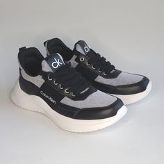 Size: 7.5 Round Toe With Bumper Logo Print Elastic Strap Textile And Man-Made Upper Lightweight New Without Box Calvin Klein Black Sneakers, Calvin Klein Sneakers, Calvin Klein Shoes, Athletic Sneakers, Calvin Klein Black, Womens Calvin Klein, Logo Print, Black Gray, Athletic Shoes