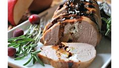 meatloaf on a plate with apples and rosemary