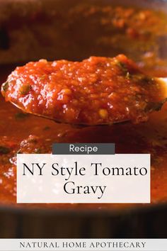 a spoon full of tomato sauce with the title recipe ny style tomato gravy