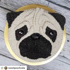 a cake with a pug face on it