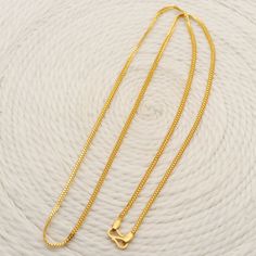 Please click -- Learn more about this item -- below for a full description 22k gold chain necklace handmade jewelry made in India Total length of the product is 22.5 inches and 2 millimeter width approx. weight is 9.74 grams approx. 22k Gold Necklaces For Puja, 22k Gold Jewelry With Delicate Chain, Gold Necklace With 22k Gold Box Chain, Gold 22k Box Chain Necklace, 22k Gold Box Chain Necklace, 22k Gold Figaro Chain Necklace As Gift, 22k Gold Necklace With Box Chain, Traditional 22k Gold Necklace With Delicate Chain, Gold Link Chain Necklace In 22k Gold