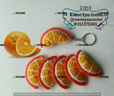 an orange keychain has been made to look like fruit