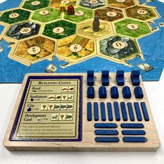 a game board with blue markers and dices