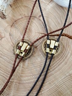 Concho 12 Gauge Shotshell Leather Bolo Tie - Unisex-SureShot Jewelry 12 Gauge Shotgun, Tie Collection, Bullet Jewelry, Western Accessories, 12 Gauge, Bolo Tie, Black And Brass, Braided Leather, Leather Cord