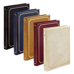 a set of five binders in various colors and designs, with gold trimmings