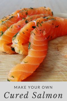 salmon on a cutting board with the words make your own cured salmon