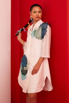 Ivory pure chanderi shirt dress with floral applique and handcrafted fringes. - Aza Fashions Festive Tunic Dress With Tassels, Summer Straight Kurta Dress With Embroidered Sleeves, Bohemian Summer Kurta With Embroidered Sleeves, Summer Bohemian Kurta With Embroidered Sleeves, Traditional Wedding Dress With Back Tassel Tie-up, White Wedding Dresses With Tassels, Elegant White Tunic With Floral Embroidery, Festive White Floral Dress, Off White Embroidered Straight Kurta Dress