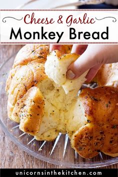 a person dipping cheese on top of bread