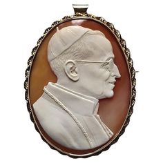 Catholic Historical Relic, Very Rare Carved Shell Cameo Pope Pius XII In 14K Solid Gold Frame. We present you with one of the most rare and unique cameos. This cameo is not only a collector's item and a piece of jewelry art but also has a significant historical value. This cameo depicts Pope Pius XII - a colorful and controversial historical figure. The highest quality of carving with the finest details makes this piece unique and unrivaled in its kind. This is a large, rather heavy cameo made o Pius Xii, Pope Pius Xii, Carved Shell, Most Expensive, Gold Frame, Jewelry Art, Solid Gold, D Art, Shells