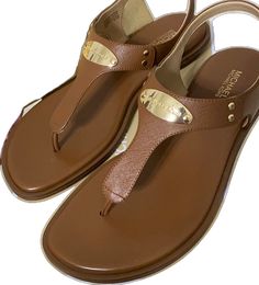 Michael Kors Brown Sandals For Summer, Michael Kors Leather Sandals With Cushioned Footbed, Michael Kors Casual Leather Sandals, Michael Kors Brown Round Toe Sandals, Casual Michael Kors Leather Sandals, Michael Kors Brown Sandals With Round Toe, Michael Kors Brown Leather Sandals, Michael Kors Casual Sandals With Cushioned Footbed, Mk Sandals