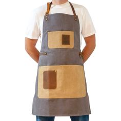 a man wearing an apron and hat with his hands on his hips, standing in front of a white background