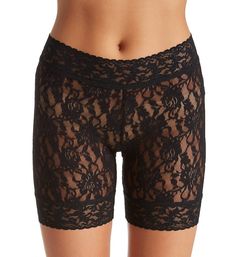 This feminine lace biker short is perfect for wearing under a stylish outfit. Sewn-on scalloped stretch lace waistband. Sheer, luxurious lace body. Rear center seam for defined fit. Mid thigh styling. Sewn-on scalloped lace hem. Sewn-in cotton crotch gusset. Perfect for wearing under dresses and skirts. Made in the USA. Please note: Model is wearing thong for modesty. Hanky Panky Women's Signature Lace Bike Short in Black | Size Medium | HerRoom.com Fitted Black Bottoms With Delicate Lace, Black Fitted Bottoms With Delicate Lace, Elegant Mid-thigh Length Shorts, Fitted Lace Shorts With Lace Trim, Fitted Lace Trim Shorts, Fitted Black Bottoms With Lace Patchwork, Black Fitted Bottoms With Lace Patchwork, Fitted Lace Shorts, Fitted Shorts With Lace Trim