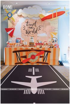 an airplane themed birthday party with food and decorations