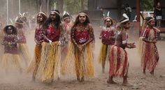 a group of people dressed in native clothing