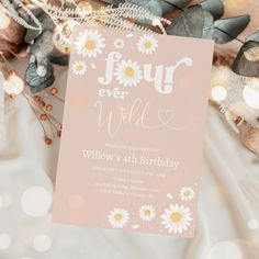 a pink birthday card with daisies on it