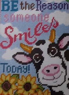 a cross stitch book with the words be the reason to someone smiles today