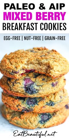 three blueberry breakfast cookies stacked on top of each other with text overlay that reads paleo and air mixed berry breakfast cookies