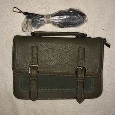 Moss Colored, Suede And Leather Cross Body Bag. Never Worn. Removable Strap Still In Plastic. Size: 10.5"L X 3.5"W X 7.5"H - 40" Strap Green Fall Satchel, Fall Green Satchel For Travel, Fall Green Travel Satchel, Fall Travel Green Satchel, Green Fall Travel Satchel, Green Satchel For Daily Use In Fall, Green Faux Leather Crossbody Satchel, Suede Purse, Leather Cross Body Bag