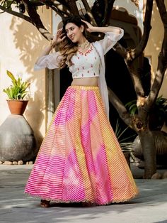 Introducing our stunning "pretty multi-color leheriya printed art silk sangeet wear lehenga choli"! This exquisite ensemble is designed to make you feel like royalty at any festive occasion, event, reception, or function like a sangeet. Crafted with care and attention to detail, this lehenga choli features a multi-color art silk material with leheriya printed work and beautiful pearl zari border work, adding a touch of elegance and sophistication to your look.
The accompanying white color choli Multicolor Anarkali Set For Summer, Multicolor Summer Anarkali Set, Multicolor Anarkali Set With Zari Work For Summer, Fitted Multicolor Anarkali Set For Summer, Summer Multicolor Fitted Anarkali Set, Summer Fitted Multicolor Anarkali Set, Multicolor Lehenga With Unstitched Blouse For Festivals, Multicolor Art Silk Choli For Saree, Multicolor Bollywood Lehenga With Unstitched Blouse