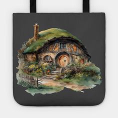 a tote bag with an image of a hobbot house in the middle