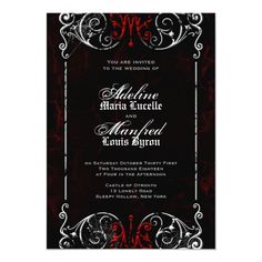 an ornate wedding card with red and black accents