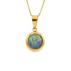 14k Yellow Gold Opal Pendant The Pendant Features One Cabochon Opal. The Opal Is Bezel Set. Chain Not Included Opal Pendants, Bezel Setting, Earings Piercings, Blue Gold, Womens Jewelry Necklace, Piercings, Opal, Color Blue, Jewelry Necklaces