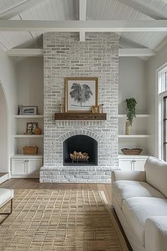 a living room filled with furniture and a fire place