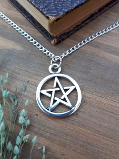 "A beautiful silver plated necklace with a matching Tibetan-silver large pentagram with a choice in chain style in either spiga and cable, in 18\"/ 45cm and 20\"/ 50cm in length. The charm length is 20mm across, and 25 mm measuring down from the chain loop. Please note: -The charms are made from Tibetan-silver that have been coated with another metal, and aren't real silver. -All orders are sent in zero plastic packaging. -Domestic orders are sent as 2nd Class Large Letters. -All international orders are sent as standard shipping. I'm not responsible for any loss, however tracked and signed is available for upgraded shipping." Gothic Silver Necklace With Round Pendant, Silver Gothic Round Pendant Necklace, Silver Gothic Necklace With Round Pendant, Gothic Silver Charm Necklace With Adjustable Chain, Silver Gothic Charm Necklace With Adjustable Chain, Gothic Sterling Silver Necklace With Silver Chain, Neo Victorian, Large Necklace, Chain Loop