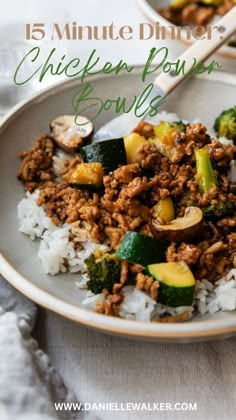 a white plate topped with rice and meat