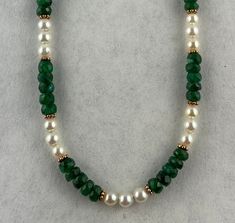 "The faceted emerald beads on this necklace are 4-5mm in diameter with a very saturated color and noticeable inclusions. They pair nicely with fifteen 4.5mm Akoya pearls and bronze Bali style spacer beads. The total length is 18\" with a bronze toggle clasp. I've strung this on soft flex wire with French wire ends. The bronze metal will darken naturally over time to give this a slightly antiqued look. This comes gift boxed and ships free USPS First Class. If you'd like faster shipping you can up Wooden Bead Jewelry, Turquoise Jewelry Necklace, Emerald Green Necklace, Beautiful Beaded Necklaces, Akoya Pearl Necklace, Tahitian Pearl Necklace, Green Beaded Necklace, Beaded Necklace Designs, Bali Style