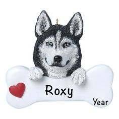 a dog ornament with a heart on it