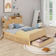 a child's bedroom with a bed, bookcase and toys on the floor