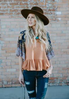 $49.95 The Oaklynn Top is a waffle knit top with a ruffle hem. The sleeves are a paisley mix patterned bell sleeve. Comes in Lagoon, Terracotta and Off White Ships in Canada, To the USA and Internationally All prices are in Canadian Dollars Cowgirl Chic, Waffle Knit Top, Pattern Mixing