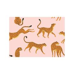 a pink background with leopards and giraffes in the same pattern on it