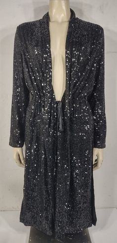 ladies beautiful sequin-embellished duster cardigan BB Dakota by Steve Madden brand black Brand new with tags! no flaws or signs of wear to speak of. MSRP $139.00. Would make a great gift! size XS (please refer to measurements below) Shell: 95% polyester, 5% spandex; Lining: 100% polyester Measurements lying flat: Bust: 21.5 inches. Length (from shoulder to bottom hem): 42 inches.  Policies and Disclosures: RETURNS: Returns are accepted within 30 days of purchase. Buyer is responsible for return Sequin Duster, Brooklyn And Bailey, Duster Cardigan, Bb Dakota, Cardigan Jacket, Black Sequins, Used Clothing, To Speak, Clothing Items