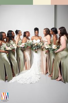 a group of women standing next to each other wearing dresses and holding bouquets in their hands