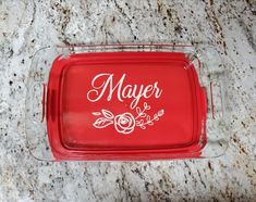 a red tray that says mayer on it