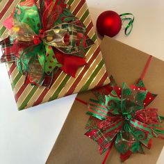 two wrapped presents sitting next to each other