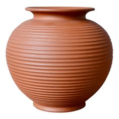 a large brown vase sitting on top of a white background