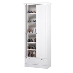 a tall white cabinet filled with lots of shoes