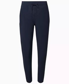 the throw-on trousers you'll wear all year round.lightweight and crease-free italian fabric.high elasticated waist with drawcord and 2 side pockets.tapered leg for a flattering fit.inseam length: 27" / 67cm.model wears size s and is 178cm/5'10" tall. Sweaty Betty, Italian Fabric, Navy Blue, Trousers, Navy, Fabric, How To Wear, Blue