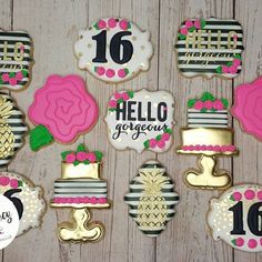 decorated cookies are arranged in the shape of flowers, pineapples, and cake