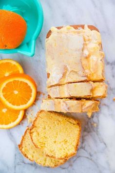 sliced oranges and slices of bread on a table