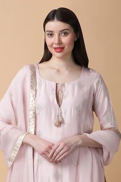 Powder pink kurta with sequin embroidery. Paired with gota embroidered dupatta and palazzo. - Aza Fashions Festive Embellished Straight Kurta Top, Anarkali Blouse With Gota Work, Wedding Straight Kurta Top With Zari Work, Festive Designer Top With Dupatta, Festive Designer Wear Tops With Dupatta, Festive Pink Straight Kurta Blouse, Anarkali Top With Mirror Work For Eid, Festive Unstitched Top With Mirror Work, Anarkali Tops With Mirror Work