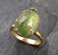 I created this setting in wax then cast it in recycled solid 18k gold at my home studio. This ring is a size 7 it can be sized. The stone is a green tourmaline. it measures about 15mm X 9.5mm I created a rustic texture in the gold. Throughout all time and history, in every tribe and culture all around the world crystals, minerals and gemstones have used for healing, luck, divination, adornment vibrational medicine and so much more. Tourmaline is a very balancing stone and helps heal and open the Pink Gemstones Ring, Gold Solitaire Engagement Ring, Pink Tourmaline Ring, Wedding Rings Solitaire, Gold Statement Ring, Ringe Gold, Wedding Rings Rose Gold, Gemstone Engagement, Popular Styles