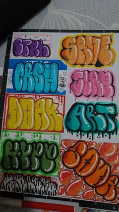 graffiti written in different colors on a piece of paper